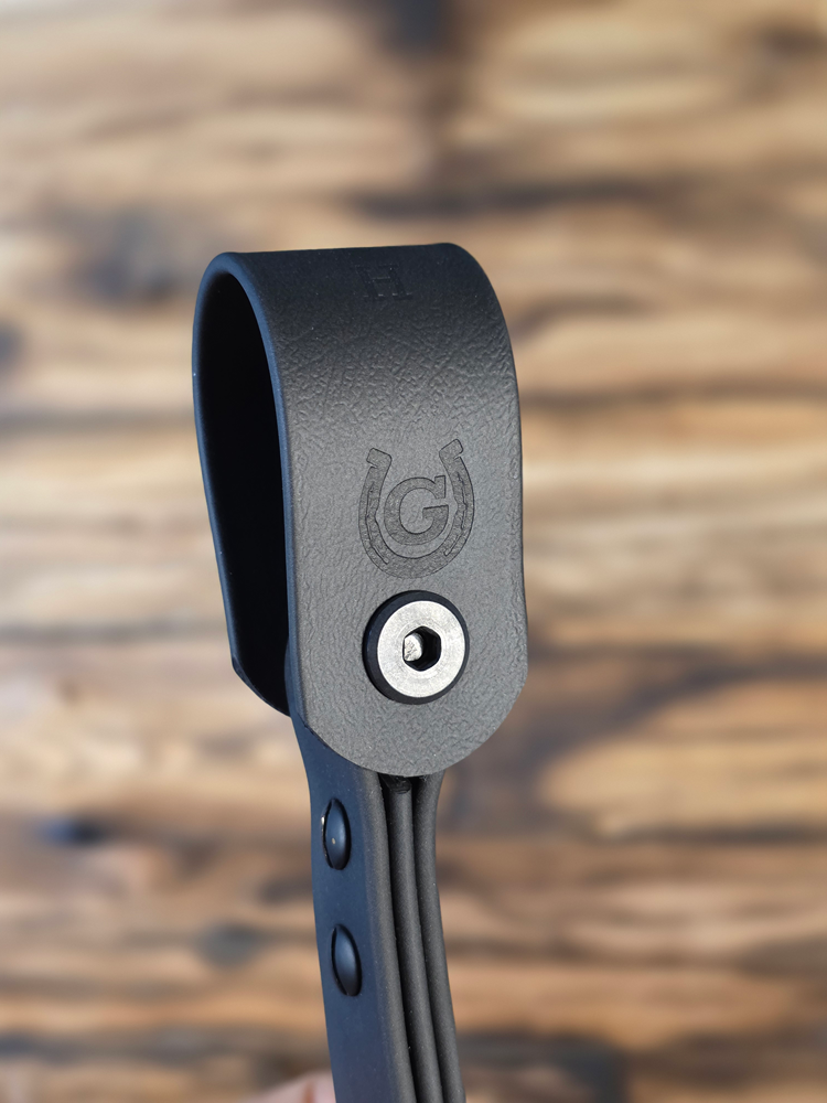 Closeup of GIDDYUPZ Logo on Biothane Slim attachment strap